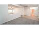 Spacious living room showcasing an open layout with access to other rooms at 7625 Fieldfare Dr, North Las Vegas, NV 89084