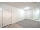 Open-concept living room with neutral paint and tile entryway at 7625 Fieldfare Dr, North Las Vegas, NV 89084