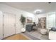 Comfortable and stylish living room featuring a desk and soft natural light at 7625 Fieldfare Dr, North Las Vegas, NV 89084