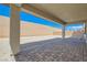 Private backyard featuring a covered patio and plenty of space for outdoor activities at 8401 Waterwood St, Las Vegas, NV 89166