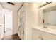 Bathroom features a white vanity and cabinet at 425 Oil Lantern Ln, Las Vegas, NV 89145