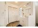 Bathroom with a sink, vanity, storage and wood look flooring at 425 Oil Lantern Ln, Las Vegas, NV 89145