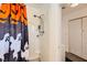 Bathroom shower with halloween shower curtain and white tile surround at 425 Oil Lantern Ln, Las Vegas, NV 89145