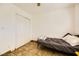 Bedroom with neutral-toned tiled floor features a closet at 425 Oil Lantern Ln, Las Vegas, NV 89145