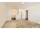 A spacious bedroom with wall to wall carpeting and natural lighting at 425 Oil Lantern Ln, Las Vegas, NV 89145