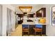 The kitchen features dark cabinets, light countertops, and stainless steel appliances at 425 Oil Lantern Ln, Las Vegas, NV 89145