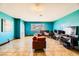 Bright living room with large window and tile flooring; perfect for entertaining at 425 Oil Lantern Ln, Las Vegas, NV 89145