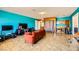 Bright living room with tile floors and ample space for furniture arrangements at 425 Oil Lantern Ln, Las Vegas, NV 89145