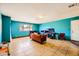 Open-concept living room with tile floors, ample space, and a welcoming atmosphere at 425 Oil Lantern Ln, Las Vegas, NV 89145