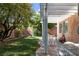 Backyard showing covered patio and landscaping at 10105 Shore Pine Ave, Las Vegas, NV 89129