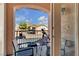 Exterior balcony with mountain views, seating and an outdoor telescope at 10105 Shore Pine Ave, Las Vegas, NV 89129