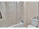 Cozy bathtub and shower with a toilet and shower curtain at 10105 Shore Pine Ave, Las Vegas, NV 89129