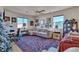 Bonus room with a patterned rug, cozy seating, and bright natural light at 10105 Shore Pine Ave, Las Vegas, NV 89129