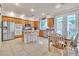 Modern kitchen with stainless steel appliances, granite countertops, and a view of the backyard at 10105 Shore Pine Ave, Las Vegas, NV 89129
