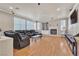 Spacious living room with built-in bookshelves and a cozy fireplace at 10105 Shore Pine Ave, Las Vegas, NV 89129