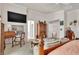 Bright primary bedroom featuring a desk, bed, sofa, and elegant decor at 10105 Shore Pine Ave, Las Vegas, NV 89129