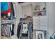 Walk-in closet with built-in shelving and hanging storage at 10105 Shore Pine Ave, Las Vegas, NV 89129