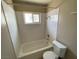 Bathroom featuring a tub and shower combo at 2516 E Mesquite Ave, Las Vegas, NV 89101