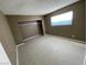 Empty room showcasing bright and airy space with an empty closet and natural light at 2516 E Mesquite Ave, Las Vegas, NV 89101