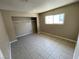 Bedroom with closet and a bright window at 2516 E Mesquite Ave, Las Vegas, NV 89101