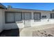 Charming single-story exterior showing the front door and two windows at 2516 E Mesquite Ave, Las Vegas, NV 89101