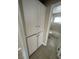 Hallway view of a bathroom with tiled flooring at 2516 E Mesquite Ave, Las Vegas, NV 89101