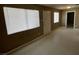 Spacious living room with tile flooring, neutral paint, and ample natural light at 2516 E Mesquite Ave, Las Vegas, NV 89101