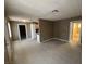 Large open living room with tile floors and view to kitchen and bathroom at 2516 E Mesquite Ave, Las Vegas, NV 89101
