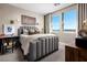 Charming bedroom with a comfortable bed and plenty of natural light at 7133 Serene Creek St, Las Vegas, NV 89131