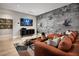 Fun game room with comfortable seating and a large TV at 7133 Serene Creek St, Las Vegas, NV 89131