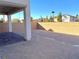 Spacious backyard with block wall and covered patio at 6349 Laverick Dr, North Las Vegas, NV 89081