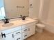 Bathroom with double vanity, bathtub and tile flooring at 6349 Laverick Dr, North Las Vegas, NV 89081