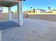 Spacious backyard with block wall and covered patio at 6353 Laverick Dr, North Las Vegas, NV 89081