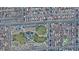 An aerial view of a neighborhood with a community park nearby at 6540 W Cougar Ave, Las Vegas, NV 89139
