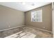 Bright bedroom with a sunlit window and carpeted floors, creating a warm and inviting space at 1438 Dire Wolf Ave, North Las Vegas, NV 89084