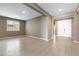 This versatile living space offers tile flooring, neutral paint, and ample natural light, ready for your personal touch at 1438 Dire Wolf Ave, North Las Vegas, NV 89084