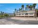 Lake Las Vegas community entrance with palm trees and signage at 20 Via Visione # 105, Henderson, NV 89011