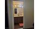 Bathroom with double sinks and a large vanity mirror at 4369 Greenhill Dr, Las Vegas, NV 89121