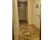 Clean hallway with tile flooring and neutral-colored walls at 4369 Greenhill Dr, Las Vegas, NV 89121