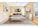 Virtually staged main bedroom with large bed and dresser at 6423 Fosco Ct, Las Vegas, NV 89131