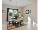 Bright dining room featuring a table with seating for six at 6423 Fosco Ct, Las Vegas, NV 89131