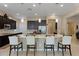 Spacious kitchen with a large island and breakfast bar at 6423 Fosco Ct, Las Vegas, NV 89131