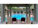 Beautiful community pool featuring seating with a relaxing view of the water at 8721 Red Brook Dr # 203, Las Vegas, NV 89128