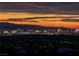 Night-time aerial view showcasing the city lights and mountain backdrop at 1228 Stellar Rim Ct, Henderson, NV 89012