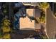 Contemporary home with a flat roof and a pool in the backyard at 1228 Stellar Rim Ct, Henderson, NV 89012