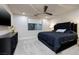 Spacious bedroom with a large bed and modern dresser at 1228 Stellar Rim Ct, Henderson, NV 89012