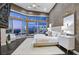 Luxurious main bedroom with city views and stylish decor at 1228 Stellar Rim Ct, Henderson, NV 89012