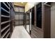 Large walk-in closet with ample shelving and drawers at 1228 Stellar Rim Ct, Henderson, NV 89012