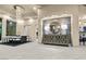 Bright dining room features a large table and chandelier at 1228 Stellar Rim Ct, Henderson, NV 89012