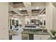 Open kitchen with granite counter tops, modern appliances, and island seating at 1228 Stellar Rim Ct, Henderson, NV 89012
